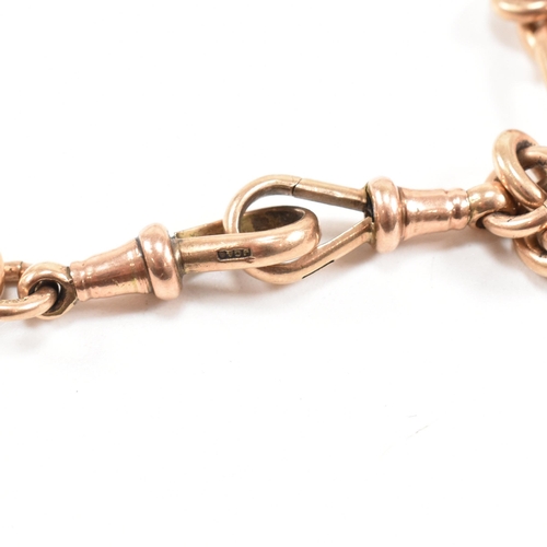 11 - A hallmarked 9ct gold Albert watch chain and sovereign fob. The Albert chain formed with chain and o... 