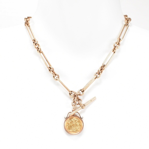 11 - A hallmarked 9ct gold Albert watch chain and sovereign fob. The Albert chain formed with chain and o... 