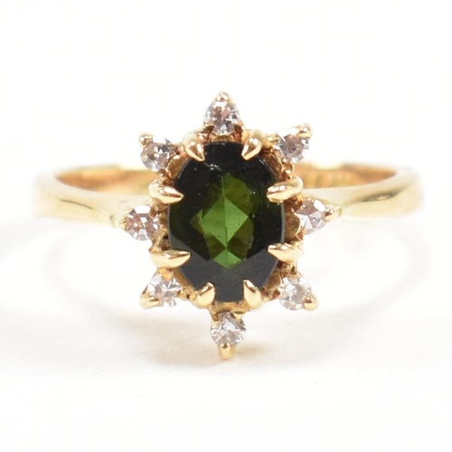 110 - Hallmarked 18ct gold tourmaline and diamond cluster ring. Weight 3.2g. Size J. All weights, measurem... 