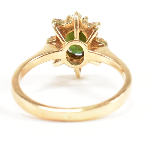 110 - Hallmarked 18ct gold tourmaline and diamond cluster ring. Weight 3.2g. Size J. All weights, measurem... 