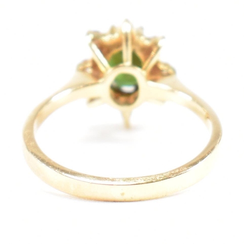 110 - Hallmarked 18ct gold tourmaline and diamond cluster ring. Weight 3.2g. Size J. All weights, measurem... 