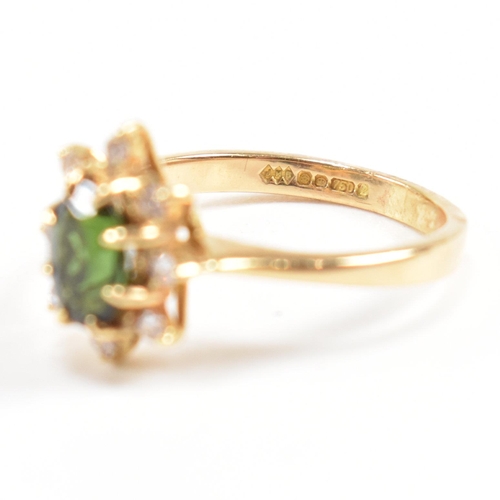 110 - Hallmarked 18ct gold tourmaline and diamond cluster ring. Weight 3.2g. Size J. All weights, measurem... 