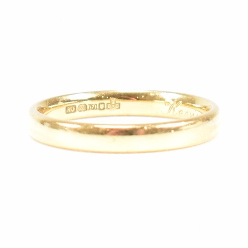 111 - A hallmarked 18ct gold band ring. The band ring inscribed Kevin & Helen 5th Feb 2000. Weight 3.2g. S... 