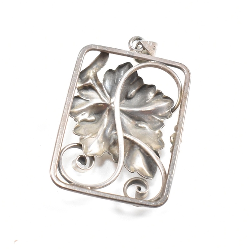 112 - A collection of Danish silver and white metal jewellery. The jewellery to include a leaf and berry b... 