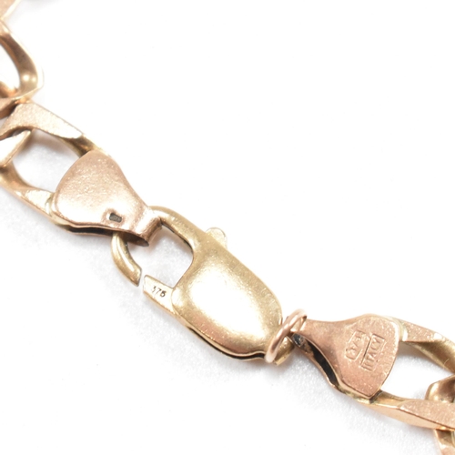 114 - A gold square curb link chain necklace. The necklace marked 375 Italy. Weight 32g. Measures 46cm. Al... 