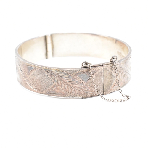 116 - A hallmarked 925 silver bangle. Hallmarked Birmingham Sponsor mark MM. Weight 44g. Diameter approx 6... 