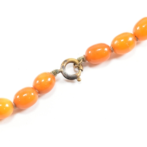 117 - A vintage butterscotch amber bead necklace. The necklace strung with graduating beads from 1.8cm to ... 