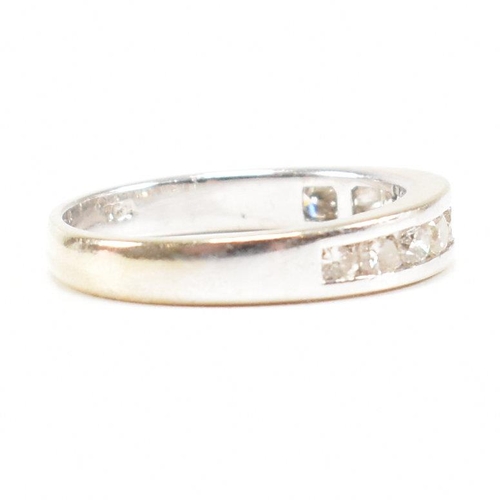 119 - A 18ct gold and diamond half eternity ring. Estimated diamond weight 0.50ct. Marked 750. Weight 2.6g... 