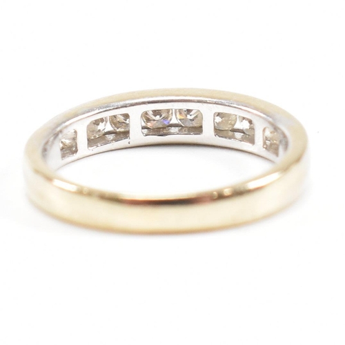 119 - A 18ct gold and diamond half eternity ring. Estimated diamond weight 0.50ct. Marked 750. Weight 2.6g... 