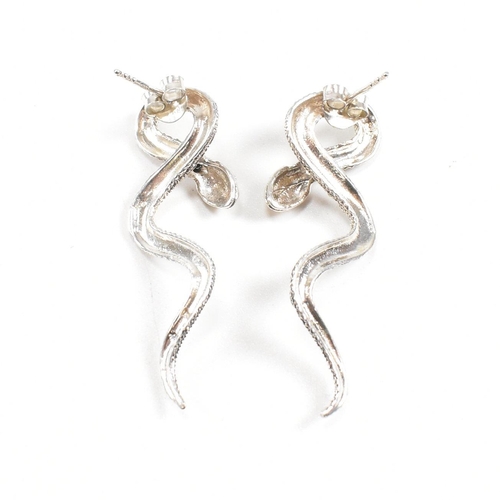 120 - A pair of contemporary 925 silver and marcasite novelty snake earrings. Combined weight approx 5.7g.... 