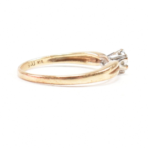 121 - A hallmarked 9ct gold and diamond solitaire ring. The ring hallmarked London. Weight 1.9g. Size P. A... 