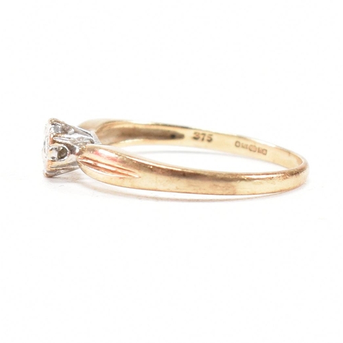 121 - A hallmarked 9ct gold and diamond solitaire ring. The ring hallmarked London. Weight 1.9g. Size P. A... 