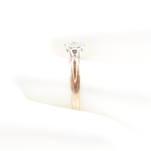 121 - A hallmarked 9ct gold and diamond solitaire ring. The ring hallmarked London. Weight 1.9g. Size P. A... 