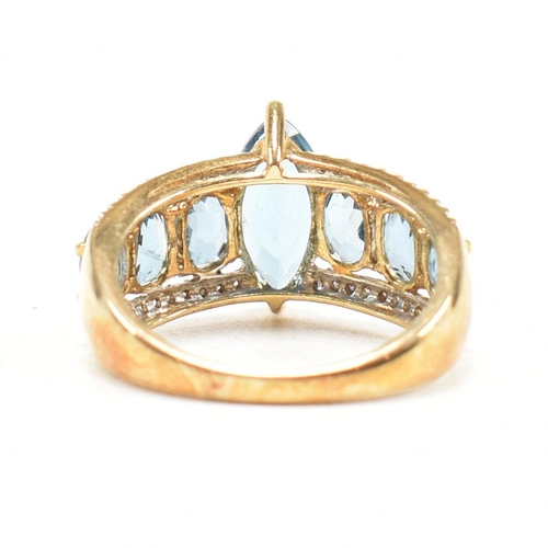 123 - A hallmarked 9ct gold topaz & diamond dress ring. Weight 4g. Size O. All weights, measurements and s... 