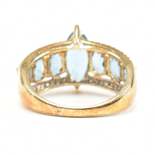 123 - A hallmarked 9ct gold topaz & diamond dress ring. Weight 4g. Size O. All weights, measurements and s... 