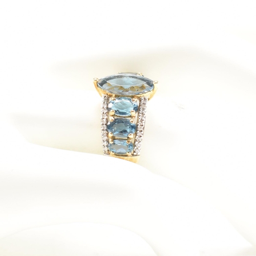 123 - A hallmarked 9ct gold topaz & diamond dress ring. Weight 4g. Size O. All weights, measurements and s... 