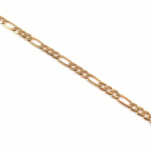 126 - A hallmarked 9ct gold Figaro chain link bracelet. Together with a yellow metal toe ring - tests indi... 