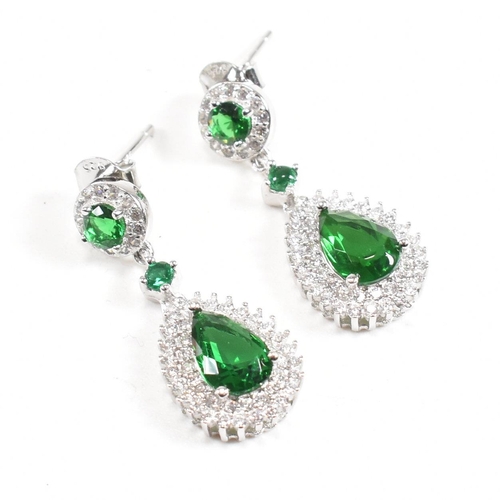 127 - A pair of contemporary 925 silver and cubic zirconia and faux emerald earrings. Weight approx 4.6g. ... 