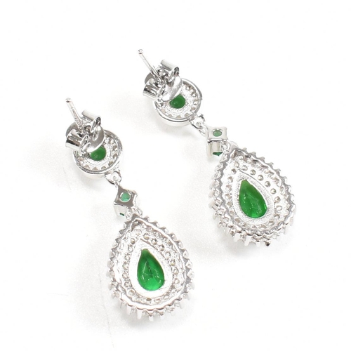 127 - A pair of contemporary 925 silver and cubic zirconia and faux emerald earrings. Weight approx 4.6g. ... 