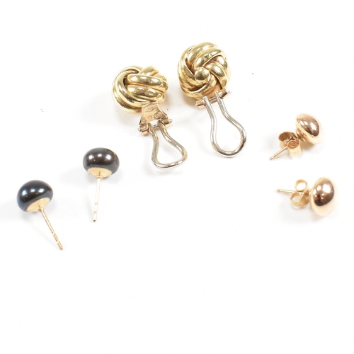 131 - A pair of 9ct gold ear clip knot earrings having continental marks, common control mark and stamped ... 