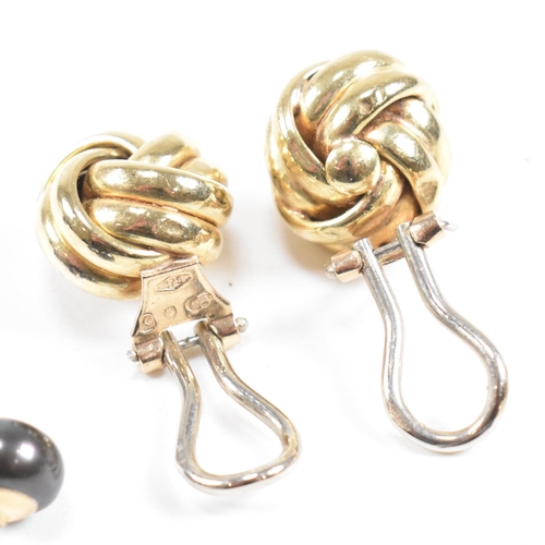 131 - A pair of 9ct gold ear clip knot earrings having continental marks, common control mark and stamped ... 