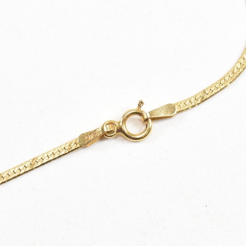 134 - A hallmarked 9ct gold flat link pendant necklace in the form of a ribbon with a bow. Total weight 3.... 