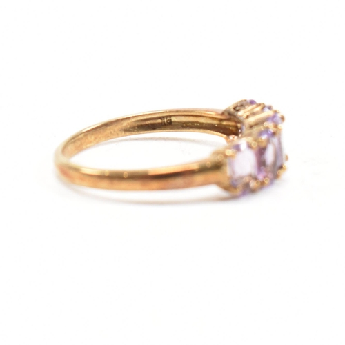 136 - A hallmarked 9ct gold and amethyst five stone ring. Weight 2.2g. Size O.5. All weights, measurements... 