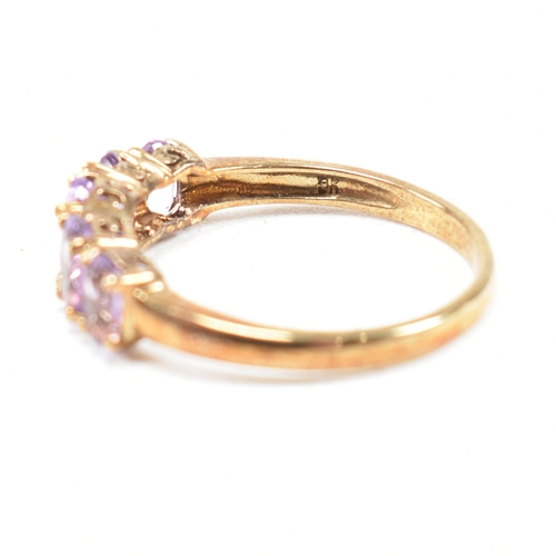 136 - A hallmarked 9ct gold and amethyst five stone ring. Weight 2.2g. Size O.5. All weights, measurements... 