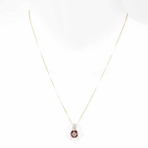 14 - A Raima Italian 18ct gold ruby and diamond pendant necklace. The necklace strung with a ruby and dia... 