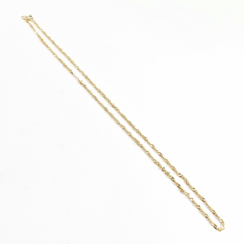 142 - A hallmarked 9ct gold fancy link rope twist chain necklace. Weight 1.9g Measures 45cm. All weights, ... 