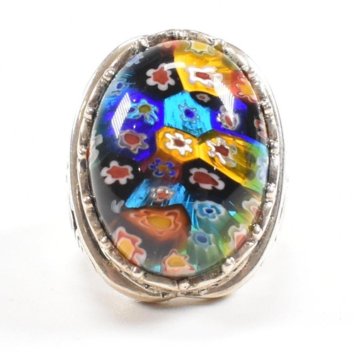 146 - A contemporary 925 silver ring set with millefiori style cabochon. Weight approx 13.2g. Size approx ... 