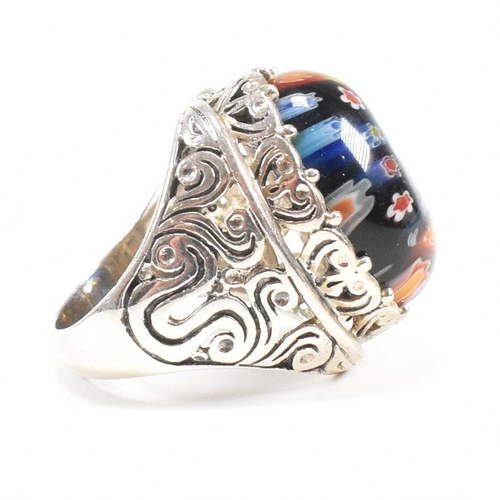 146 - A contemporary 925 silver ring set with millefiori style cabochon. Weight approx 13.2g. Size approx ... 