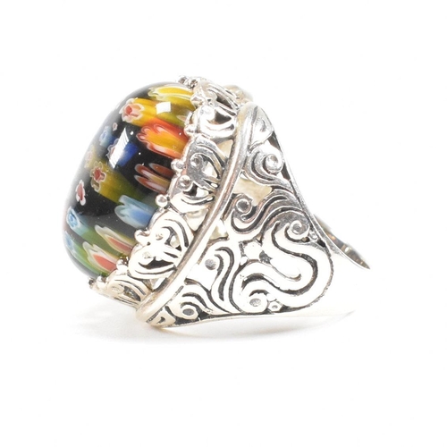 146 - A contemporary 925 silver ring set with millefiori style cabochon. Weight approx 13.2g. Size approx ... 