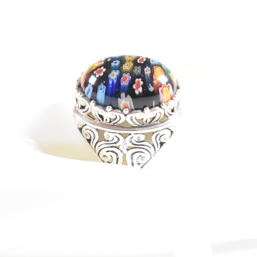 146 - A contemporary 925 silver ring set with millefiori style cabochon. Weight approx 13.2g. Size approx ... 