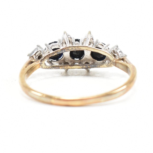 147 - A hallmarked 9ct gold sapphire and diamond cluster ring. Weight 2.4g. Size P. All weights, measureme... 