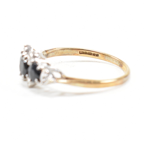 147 - A hallmarked 9ct gold sapphire and diamond cluster ring. Weight 2.4g. Size P. All weights, measureme... 