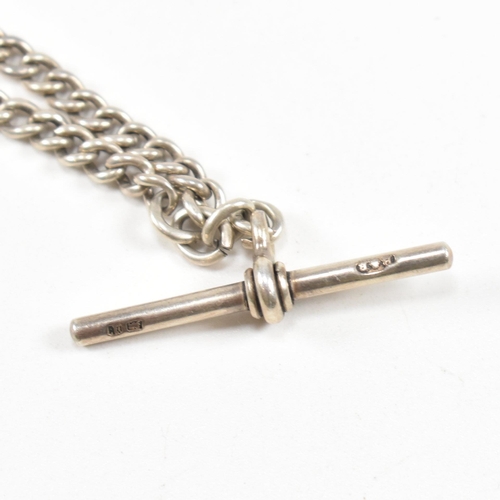 148 - A silver hallmarked albert pocket watch chain with medal, t-bar and c-clasp. Marks illegible to the ... 