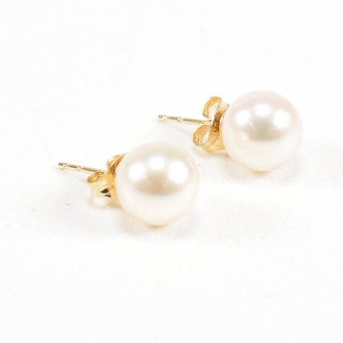 149 - A hallmarked 18ct gold and cultured pearl necklace and earring suite. Hallmarked 18ct gold. Weight 3... 