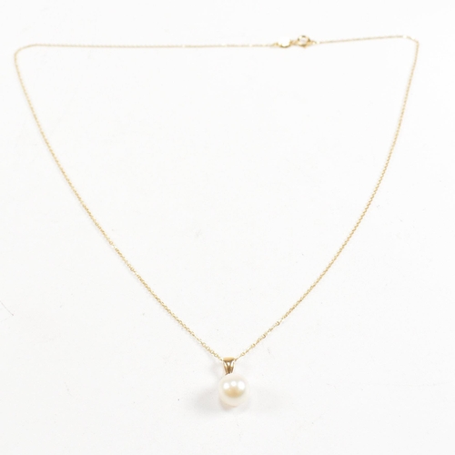 149 - A hallmarked 18ct gold and cultured pearl necklace and earring suite. Hallmarked 18ct gold. Weight 3... 