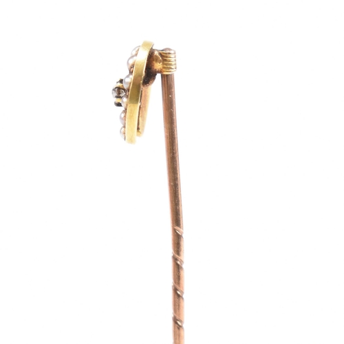 15 - A cased early 20th century gold, pearl and diamond horseshoe stick pin. Case for George Wells Hampst... 