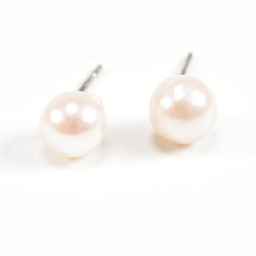 153 - A pair of freshwater pearl and 925 silver earrings. Weight approx 0.7g. Measures approx 0.5cm. All w... 