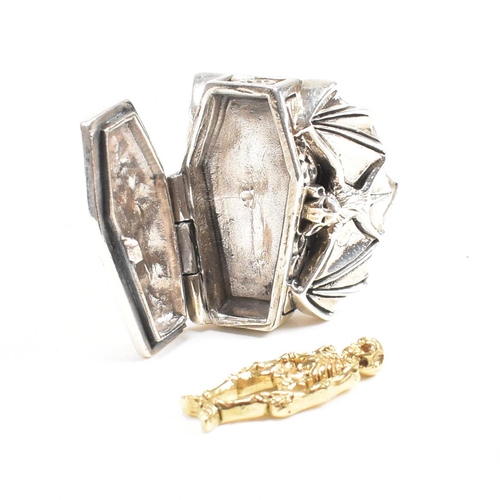 159 - A contemporary 925 Sterling coffin ring. Stamped 925 Sterling. Weight approx 20.5g. Size approx R-S.... 