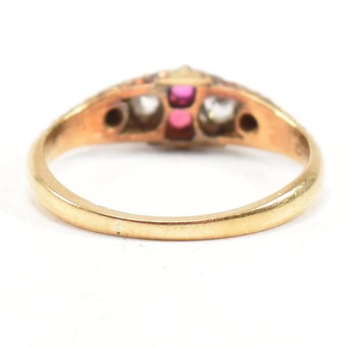 16 - A hallmarked Victorian 18ct gold gem set ring. The ring set with rubies and diamonds with one paste ... 