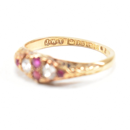 16 - A hallmarked Victorian 18ct gold gem set ring. The ring set with rubies and diamonds with one paste ... 