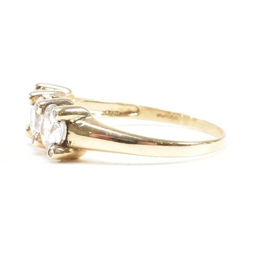 165 - A hallmarked 9ct gold and topaz three stone dress ring. Weight 2.6g. Size S.5. All weights, measurem... 