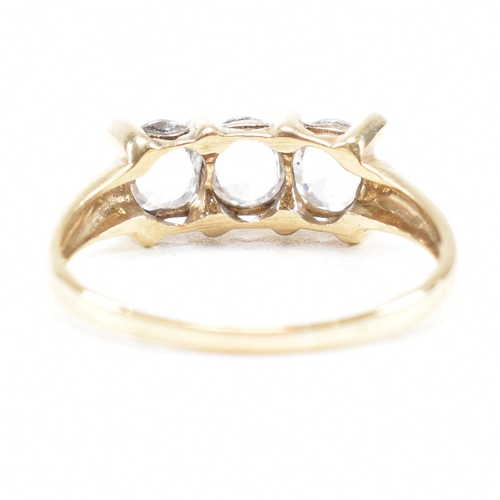 165 - A hallmarked 9ct gold and topaz three stone dress ring. Weight 2.6g. Size S.5. All weights, measurem... 