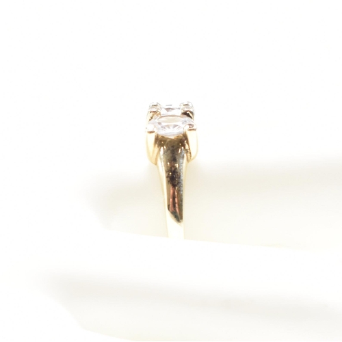 165 - A hallmarked 9ct gold and topaz three stone dress ring. Weight 2.6g. Size S.5. All weights, measurem... 