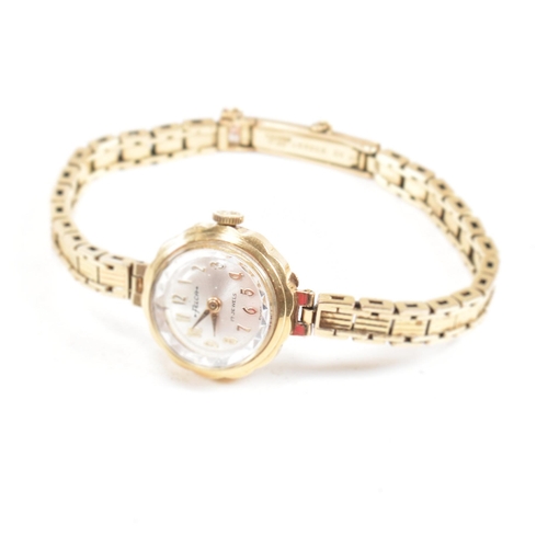 A hallmarked 9ct gold Felca 17 jewel wrist watch. The watch having a ...