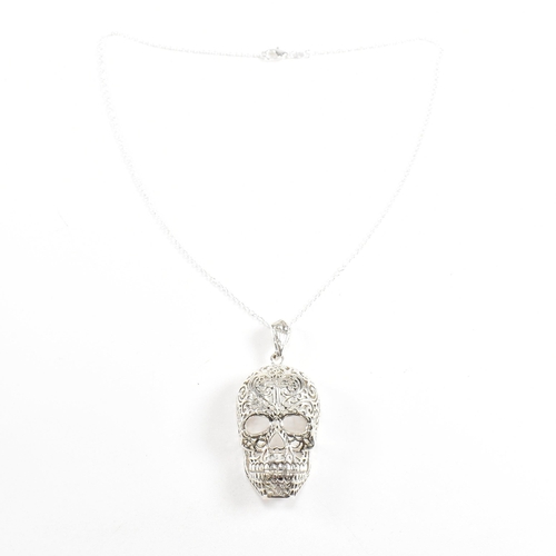 172 - A contemporary sterling silver novelty skull necklace. Weight approx 15.6g. Measures approx 4.3cm x ... 