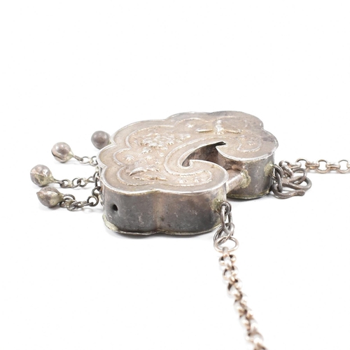 178 - A Qing dynasty silver Chinese amulet necklace. The necklace traditionally given to babies at 100 day... 